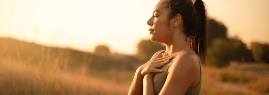 Mother using breath to calm herself during a quiet moment. Learn more about how you can use your breath to access calm through the chaos of motherhood at www.shineom.com.au/articles